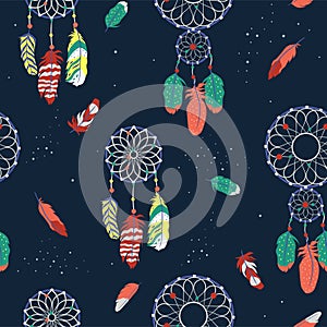 Seamless pattern with feathers and dream catchers. Vector graphics