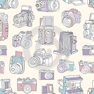 Seamless pattern with film and digital photographic or photo cameras on light background. Photography backdrop. Hand