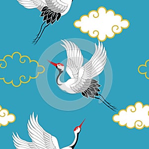 Seamless pattern with flying birds. Crane. Heron. Japanese pattern. Ornament with oriental motifs. Vector.