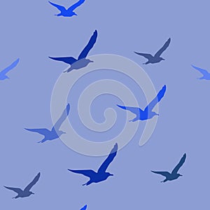 Seamless pattern with flying seagulls on blue background, vector eps 10