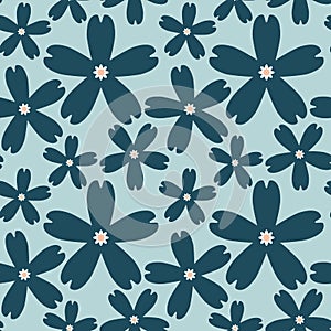 Seamless pattern. The foreground consists of fictional flowers.The background consists of squares cut by a five-pointed star.