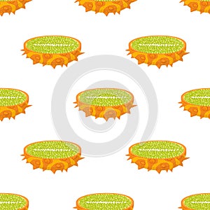 Seamless pattern with fresh half cut yellow kiwano fruit isolated on white background. Summer fruits for healthy