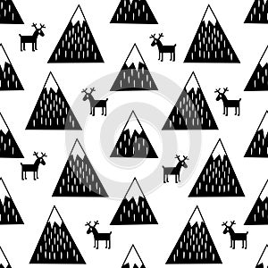 Seamless pattern with geometric snowy mountains and reindeers. Cute winter mountains background.