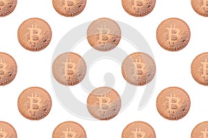 Seamless pattern of gold coin bitcoin on a white background close-up. Physical bit coins background.