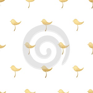 Seamless pattern of golden birds. Gold paint on textured paper
