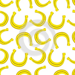 Seamless pattern with golden horseshoes.