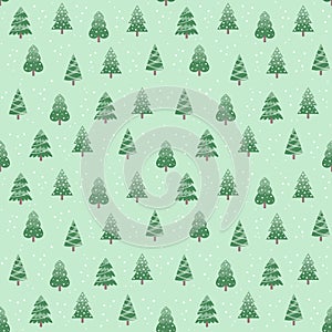 Seamless pattern with green Christmas trees on a pastel green background. Vector illustration