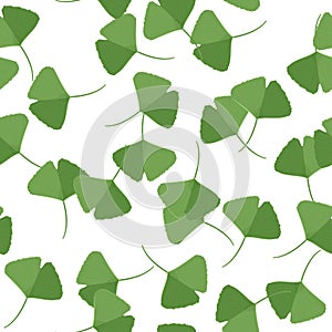 Seamless pattern with green ginkgo leaves. Natural simple background