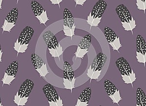 Seamless pattern with guinea fowl feathers.