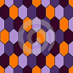 Seamless pattern in Halloween traditional colors with diamonds grid. Turtle shell motif. Honeycomb wallpaper.