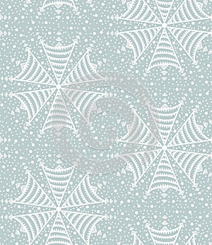 Seamless pattern. Hand drawn abstract winter snowflakes. Stylish crystal stars on cream background. Elegant boho holiday all over