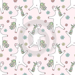 Seamless pattern of hand-drawn cartoony smiling unicorns with flowers. Vector background image for holiday, baby shower, prints, w