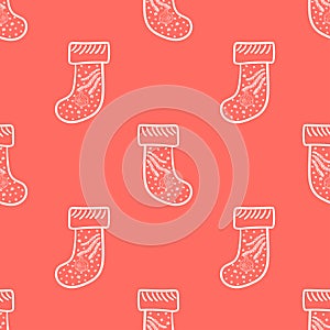 Seamless pattern with the hand drawn Christmas stockings is on the red background. The save with the Clipping Mask