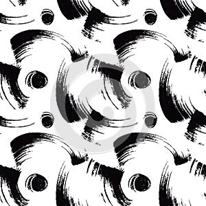 Seamless pattern with hand drawn circle black brush strokes on white background.Ink illustration.