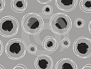 Seamless Pattern of Hand Drawn Circles with Paint Spots on Gray Background.