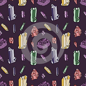 Seamless pattern with hand drawn colorful crystals and pendants on purple background.