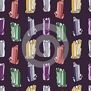 Seamless pattern with hand drawn colorful crystals on purple background