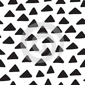Seamless pattern with hand drawn doodle triangles
