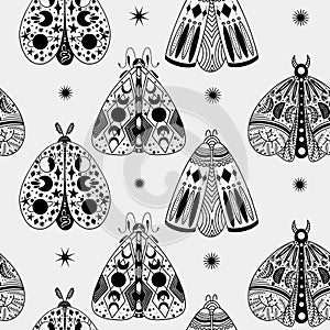 Seamless pattern of hand drawn line art mystical celestial moths