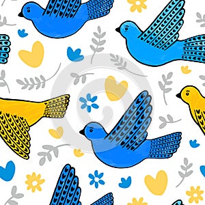 Seamless pattern of hand drawn peace doves in blue and yellow colors.