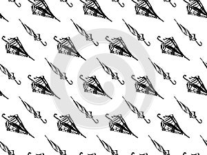 Seamless pattern with hand drawn umbrellas. Vector endless sketch black illustration on white background