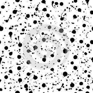 Seamless pattern with hand painted with ink splashes, spots, drops on a white background.