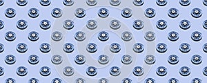 A seamless pattern of hard drive parts isolated on a blue background.