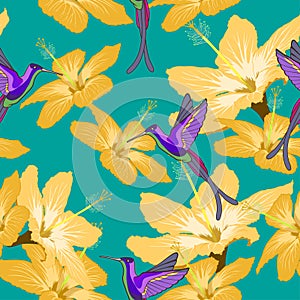 Seamless pattern with hibiscus flowers and hummingbird on green