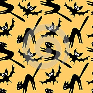 Seamless pattern with a hissing angry black witch cat and bats. Happy Halloween. Textured background for greeting card, invitation