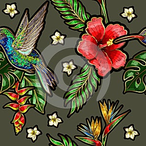 Seamless pattern with humming bird, hibiscus flowers and tropical leaves.