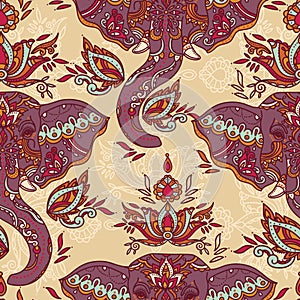 Seamless pattern with indian elephants and beautiful paisley ornament