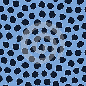 Seamless pattern. Indigo blue hand drawn imperfect polka dot spot shape background. Monochrome textured dotty ink circle all over