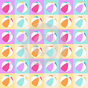 Seamless pattern with isolated beach balls on squares in pastel colors