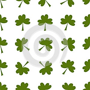 Seamless pattern: isolated green clover on a white background. Flat vector. Illustration.