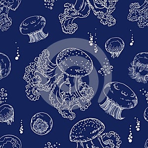 Seamless pattern with jellyfish on navy blue background.