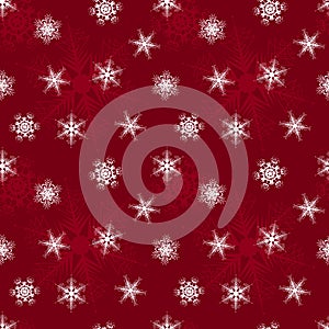 Seamless pattern of lacy snowflakes on a red background