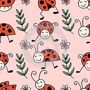 Seamless pattern with ladybugs and flowers.
