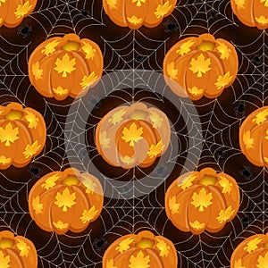 Seamless pattern with luminous pumpkin and cobwebs