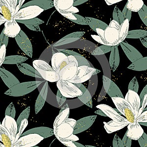 Seamless pattern of magnolia flowers and green leaves on black background