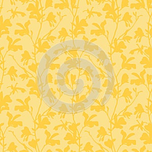 Seamless pattern with magnolia tree blossom. Yellow floral background with branch and magnolia flower. Spring design