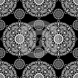 Seamless pattern mandala mehndi floral lace elements of buta decoration items on black background