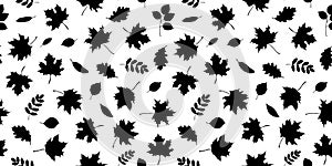Seamless pattern with maple leaves silhouettes