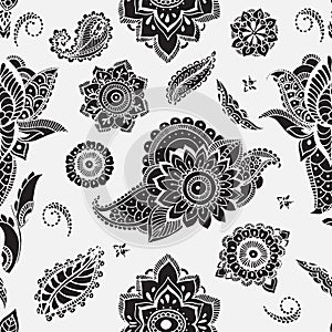 Seamless pattern with mehndi elements. Floral wallpaper with stylized flowers, leaves, indian paisley. Vector black and