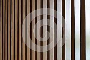 Seamless pattern of modern wall covering with light brown wooden slats