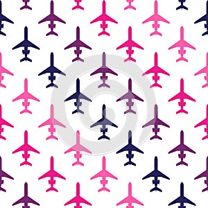 Seamless pattern with multicolored airplanes on white background