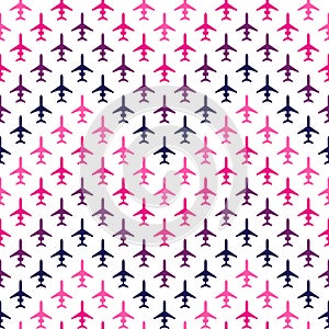 Seamless pattern with multicolored passenger airplanes