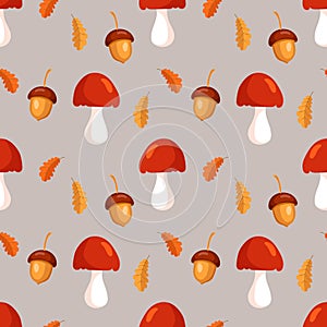 Seamless pattern, mushrooms, acorns and oak leaves on a beige background. Autumn print, textile, vector