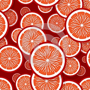 Seamless pattern of orange fruit slice graphics.