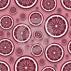 Seamless pattern of orange fruit slice graphics.