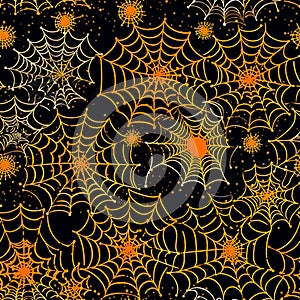 Seamless pattern of orange and yellow Halloween spider webs on black background.